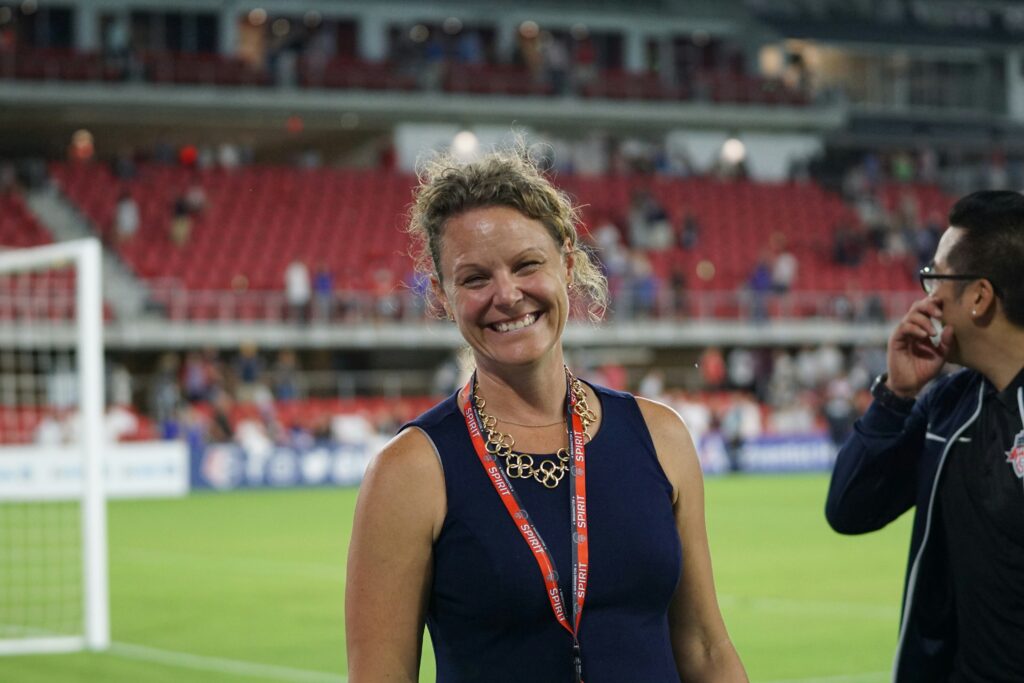A women during women soccer match wearing her soccer ID Documentation around her neck: Matchday Soccer Bag