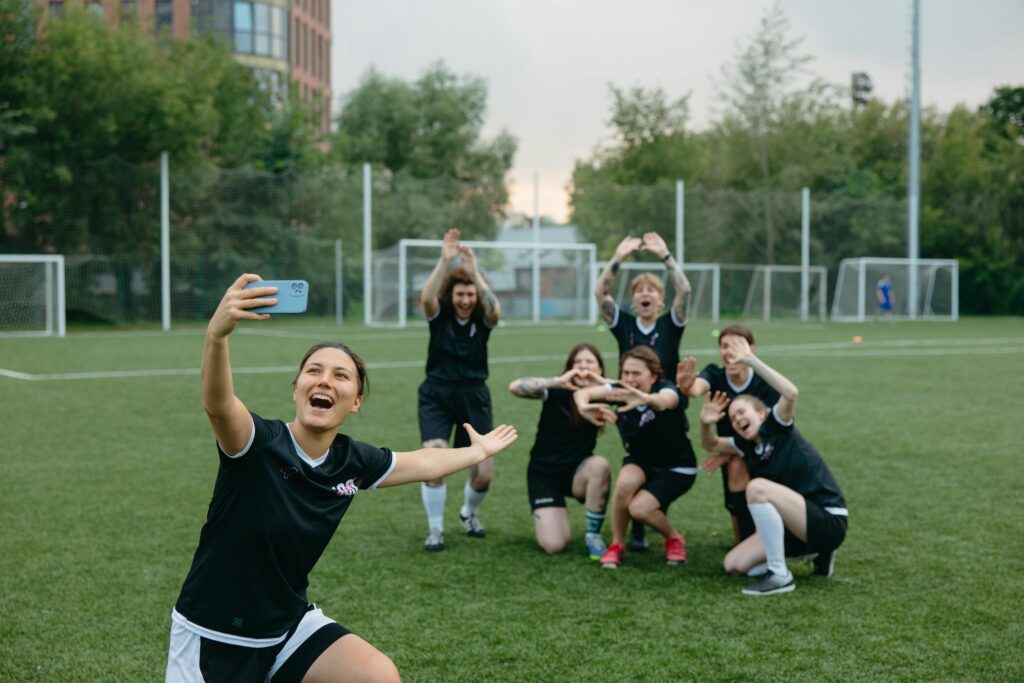 Soccer women taking a social group photo