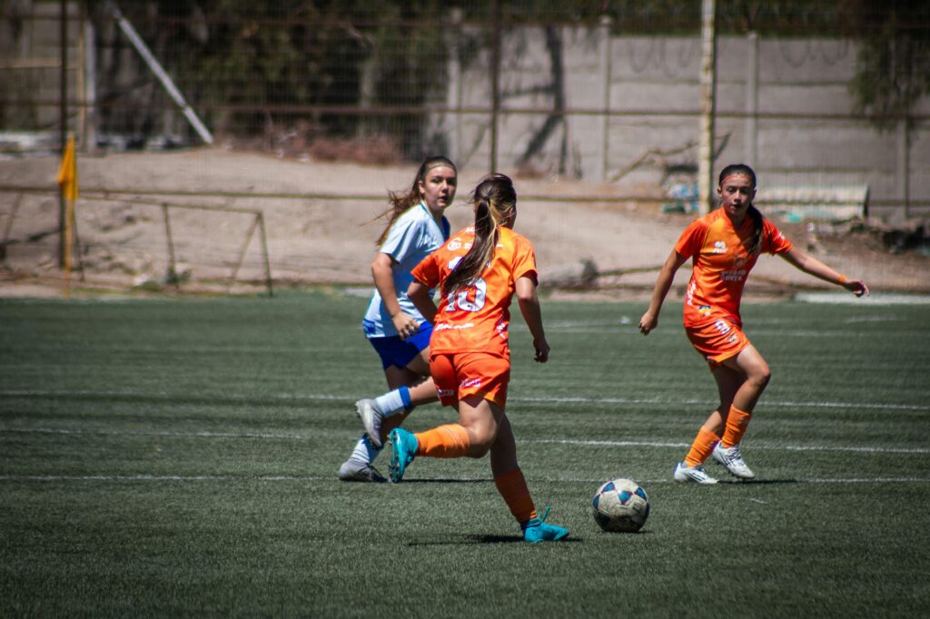 women soccer match action